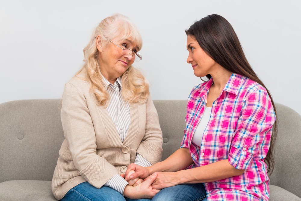 A healthcare professional providing personalized care to an elderly participant at Sunray ADHC, ensuring their unique needs are met with compassion and respect